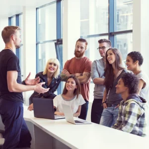Team collaboration in a modern office setting, available at Elevate Your Organization's Culture and Performance With CEEK.
