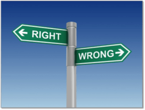 Right and wrong directional signs against a blue sky, symbolizing decision-making, available at Elevate Your Organization's Culture and Performance With CEEK.