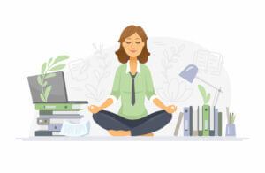 Woman meditating at office desk with laptop, books, and plants, promoting workplace wellness at Elevate Your Organization's Culture and Performance With CEEK.