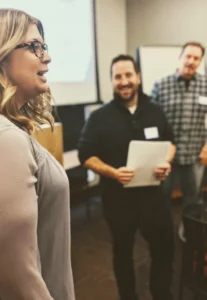 Team collaboration and discussion in a professional setting, available at Elevate Your Organization's Culture and Performance With CEEK.