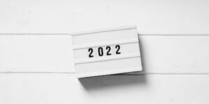 2022 sign on a white background, symbolizing reflection and growth, only available at Elevate Your Organization's Culture and Performance With CEEK.